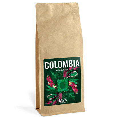 Biała torebka kawy specialty 1kg z etykietą 'Colombia Finca El Faldón' na zielonym tle, ozdobioną ilustracją liści, kwiatów i geometrycznego wzoru. Produkt marki Java Coffee Roasters, sfotografowany na białym tle