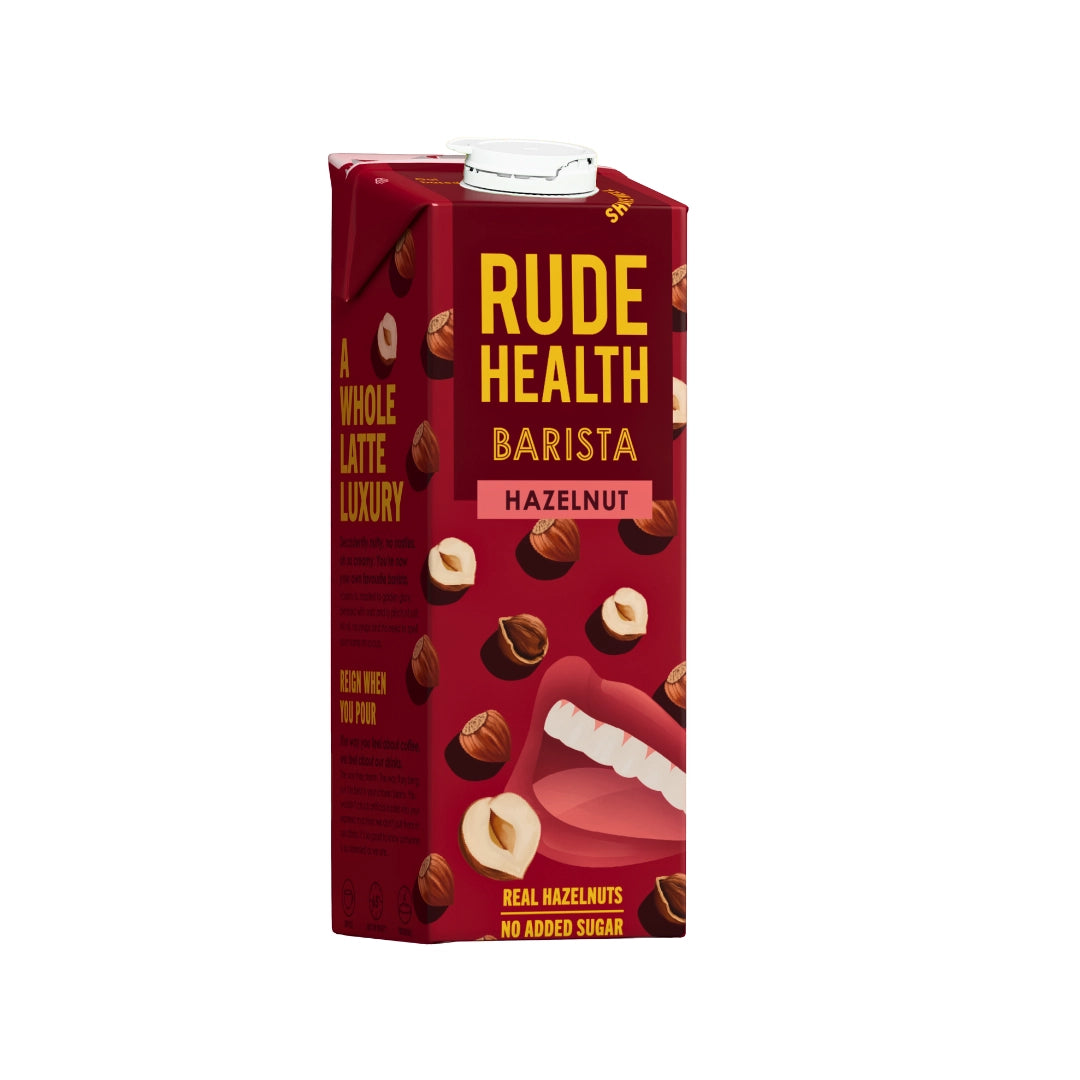 Napój roślinny Rude Health Barista Hazelnut 1L w bordowym kartonie z grafiką orzechów laskowych i otwartych ust, idealny do kawy bez dodatku cukru.