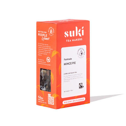 opakowanie herbaty Suki Tea Mince Pie Fairtrade w pomarańczowym pudełku z białą etykietą na białym tle